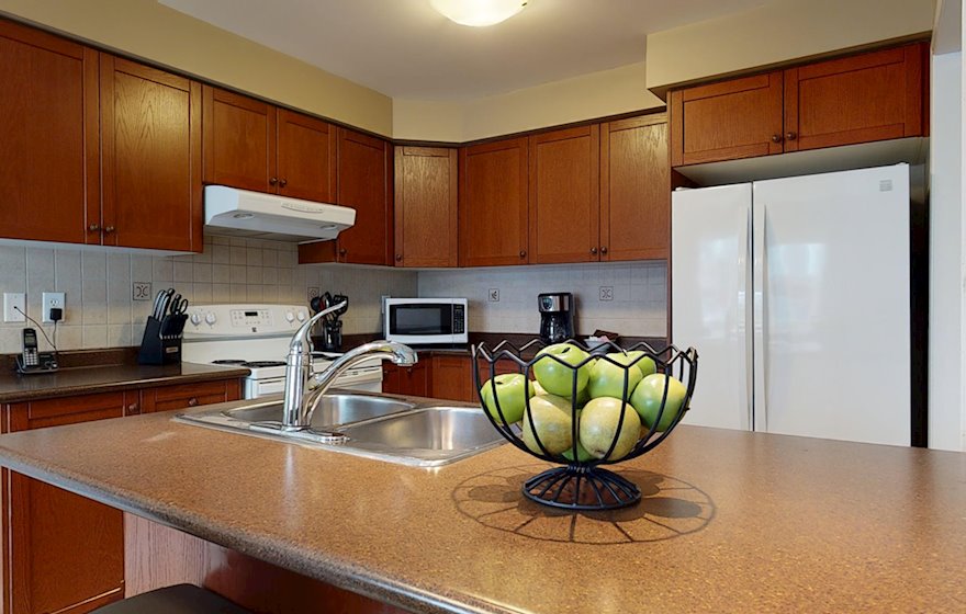 Kitchen - In Suite Laundry Furnished Apartment Suite Burlington